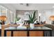 Cozy open-concept living area with stylish furnishings and decor at 10300 Bent Brook Pl, Las Vegas, NV 89134
