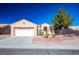 Well-maintained house exterior with landscaping at 10424 Snyder Ave, Las Vegas, NV 89134