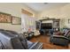 Living room with hardwood floors and comfortable leather seating at 10424 Snyder Ave, Las Vegas, NV 89134