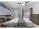 Large Primary bedroom with king bed, ceiling fan, and access to patio at 113 Emerald Forest St # 203, Las Vegas, NV 89145