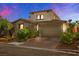 Two-story house with stone accents and attached garage at 11333 Hedgemont Ave, Las Vegas, NV 89138