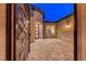 Private courtyard entrance with decorative gate at 116 Stone Mesa Ct, Henderson, NV 89011