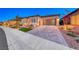Modern home with driveway and landscaping at 116 Stone Mesa Ct, Henderson, NV 89011