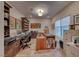 Home office with built-in desks and ample book shelving at 116 Stone Mesa Ct, Henderson, NV 89011