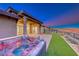 Enjoy a relaxing soak in this hot tub with amazing sunset views at 116 Stone Mesa Ct, Henderson, NV 89011