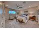 Relaxing main bedroom with a comfortable seating area at 116 Stone Mesa Ct, Henderson, NV 89011