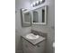 Bright bathroom with granite countertop, sink, and vanity at 2112 Venus Ave # A, North Las Vegas, NV 89030