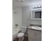 Updated bathroom with granite vanity and bathtub shower at 2112 Venus Ave # A, North Las Vegas, NV 89030