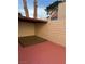 Private patio area with covered seating and brick wall at 2112 Venus Ave # A, North Las Vegas, NV 89030