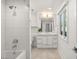 Simple bathroom with white subway tile and a bathtub shower combo at 2327 Alta Dr, Las Vegas, NV 89107