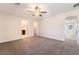 Large bedroom with gray carpet and a ceiling fan at 3272 Palindrome Ave, Henderson, NV 89044