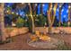 Inviting backyard with firepit and string lights at 3390 Brookfield Dr, Las Vegas, NV 89120