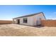Spacious backyard featuring a block wall and desert landscaping at 4540 S Pienza Ct, Pahrump, NV 89061