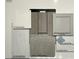 Selection of tile, flooring, and cabinet colors including AZT Quartz Pebble and Aristokraft Elkins Purestyle Stone Grey at 4540 S Pienza Ct, Pahrump, NV 89061