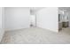 Spacious main bedroom with neutral carpet and ensuite bath with dual vanity at 4540 S Pienza Ct, Pahrump, NV 89061