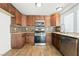 Modern kitchen with stainless steel appliances and granite countertops at 4878 Castle Rock Ct, Las Vegas, NV 89147