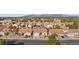 Aerial perspective of a neighborhood with houses featuring tile roofs at 5612 Crimson Ridge Dr, Las Vegas, NV 89130