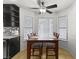 Bright dining area with wood table and chairs at 5612 Crimson Ridge Dr, Las Vegas, NV 89130