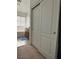 Primary bathroom with a large closet, bathtub, and vanity at 616 Taliput Palm Pl, Henderson, NV 89011