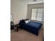 Comfortable bedroom with a double bed and plenty of natural light at 616 Taliput Palm Pl, Henderson, NV 89011