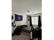 Spacious bedroom with a double bed, a large window, and plenty of space at 616 Taliput Palm Pl, Henderson, NV 89011