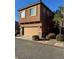 Two-story house with attached garage and light brown exterior at 616 Taliput Palm Pl, Henderson, NV 89011