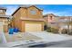Two-story house with attached garage and desert landscaping at 9204 Weeping Hollow Ave, Las Vegas, NV 89178