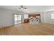 Open-concept living space with access to kitchen, backyard, and stairs to the second floor at 9204 Weeping Hollow Ave, Las Vegas, NV 89178