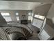 High-ceiling entryway with a stunning view of the living room and staircase at 9356 Sparkling Waters Ave, Las Vegas, NV 89129