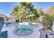 Inviting kidney shaped pool with a spa at 9604 Rancho Palmas Dr, Las Vegas, NV 89117