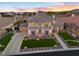 Grand two-story home with a beautiful landscaped front yard at 9605 Verlaine Ct, Las Vegas, NV 89145