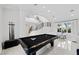 Game room featuring a sleek pool table and plenty of seating at 9605 Verlaine Ct, Las Vegas, NV 89145