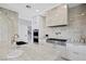 Modern kitchen with stainless steel appliances and marble countertops at 9605 Verlaine Ct, Las Vegas, NV 89145