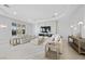 Light filled living room with modern fireplace and comfortable seating at 9605 Verlaine Ct, Las Vegas, NV 89145