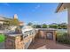 Built-in stainless steel grill and outdoor kitchen at 9605 Verlaine Ct, Las Vegas, NV 89145