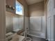 Bright bathroom featuring a tub, toilet, and vanity at , North Las Vegas, NV 89031