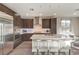 Modern kitchen with stainless steel appliances and an island at 10066 Bismuth St, Las Vegas, NV 89183