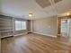 Bedroom with built-in shelves and hardwood floors at 10279 Montes Vascos Dr, Las Vegas, NV 89178