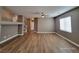 Spacious living room with hardwood floors and neutral walls at 10279 Montes Vascos Dr, Las Vegas, NV 89178
