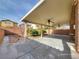 Covered patio with ceiling fan, perfect for outdoor relaxation at 10279 Montes Vascos Dr, Las Vegas, NV 89178