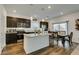 Modern kitchen with island and granite countertops at 10467 Joaquin Fire St, Las Vegas, NV 89141