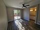 Bedroom with backyard access and ceiling fan at 10733 Moon Flower Arbor Pl, Las Vegas, NV 89144