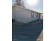 Side view of house with light colored siding at 1450 Fern St, Pahrump, NV 89060