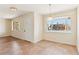 Bright dining room with tile floors and street view at 201 Catalini St, Las Vegas, NV 89107