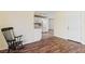 Bright living room with hardwood floors and a view of the kitchen at 201 Catalini St, Las Vegas, NV 89107