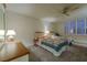 Bedroom with two twin beds and window seating at 205 E Harmon Ave # 609, Las Vegas, NV 89169