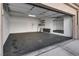 Spacious single-car garage with epoxy floor and extra storage at 2153 Gravel Hill St # 203, Las Vegas, NV 89117