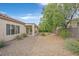 Spacious backyard with gravel and covered patio at 2250 Bensley St, Henderson, NV 89044