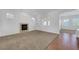 Living room with fireplace and neutral carpeting at 2470 Lothian St, Henderson, NV 89044