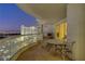 Balcony with table and chairs, offering stunning city views at 2777 Paradise Rd # 2001, Las Vegas, NV 89109
